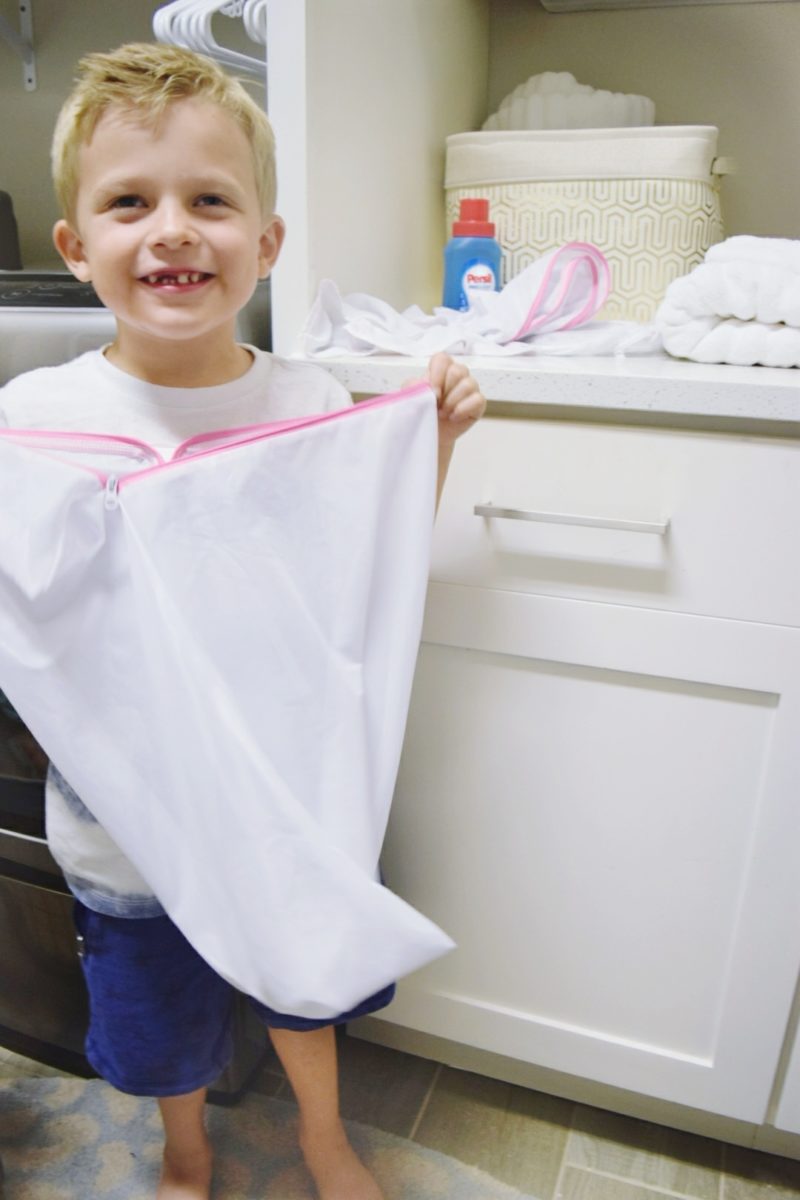 Kids helping out with laundry day