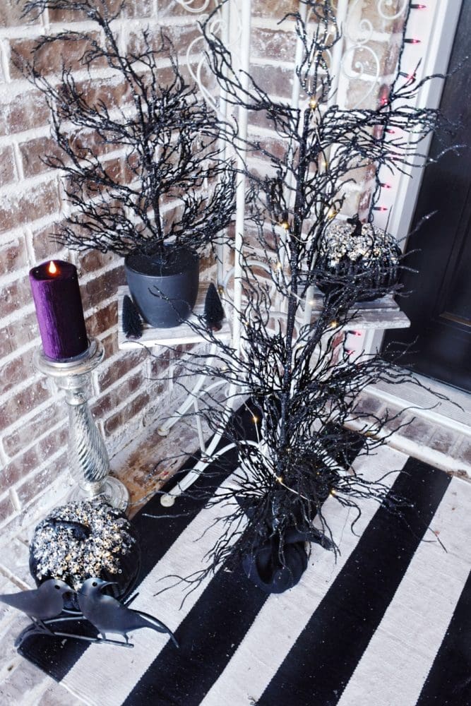 Frightful front porch modern chic halloween decorating ideas led pre lit spooky black trees purple velvet led candles how to decorate my front porch for Halloween 