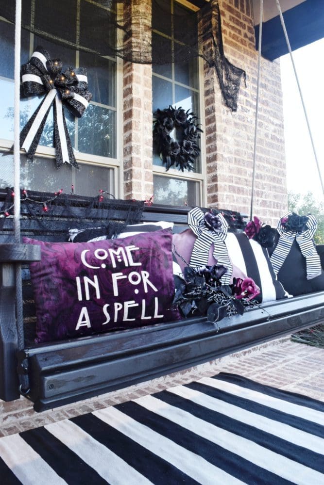 Frightful front porch modern chic halloween decorating ideas halloween pillows purple and black halloween decor black and white stripes elegant halloween