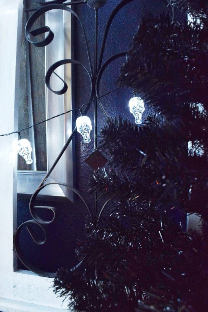 A Haunted Halloween Dinner Party Skull String Lights Black Halloween Trees Halloween Decor Black and White Halloween Decorations Modern Halloween Decor 