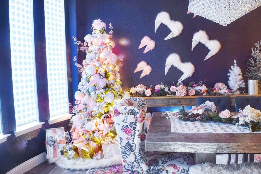 Angelic Glam Whimsical Christmas Dining Room with Feather Angel Wings pink and white christmas ornaments and rose gold christmas decorations