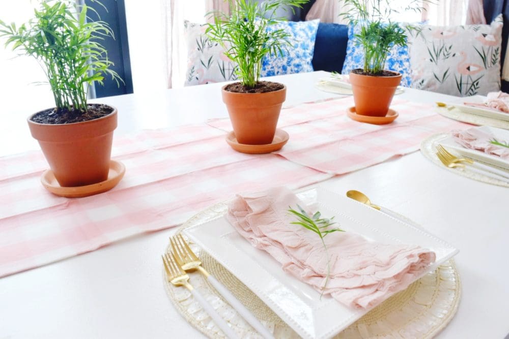 fresh spring decorating ideas for simple table setting ideas with modern coastal touches of tropical plants and blush pinks