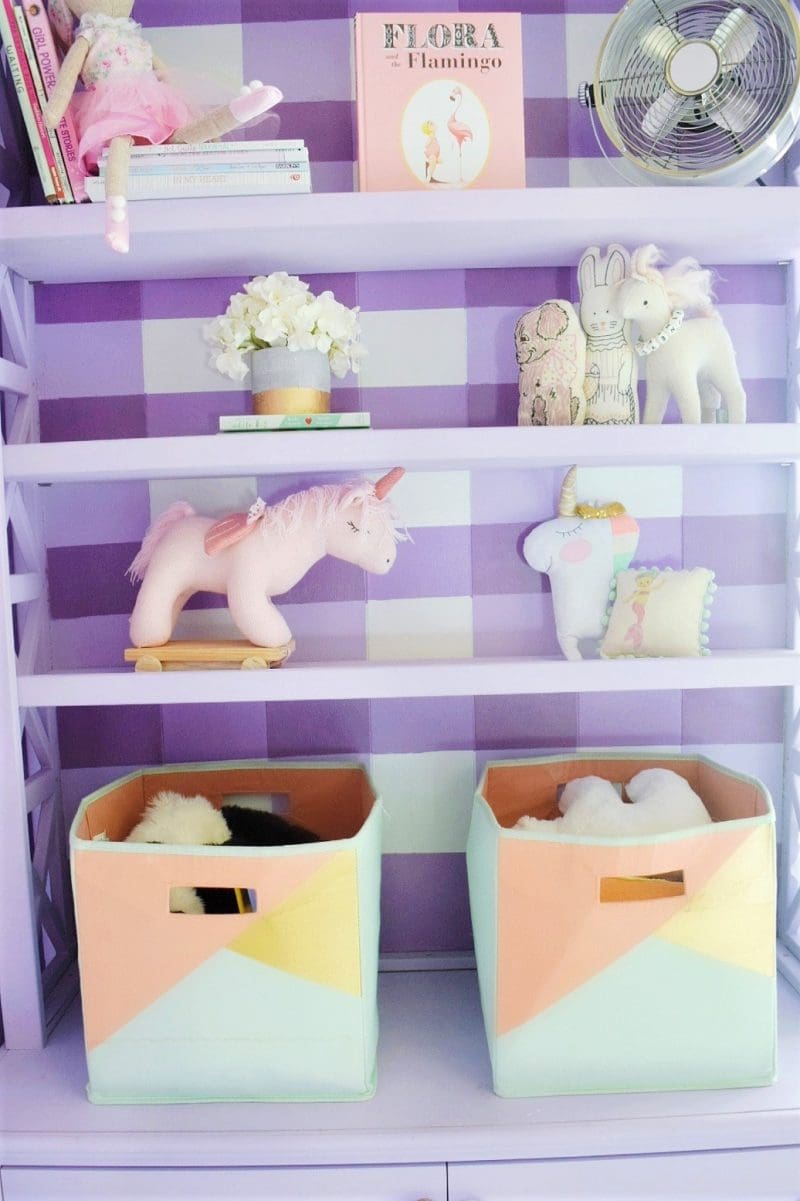 sherwin williams wisteria painted buffalo check bookshelf in little girls room