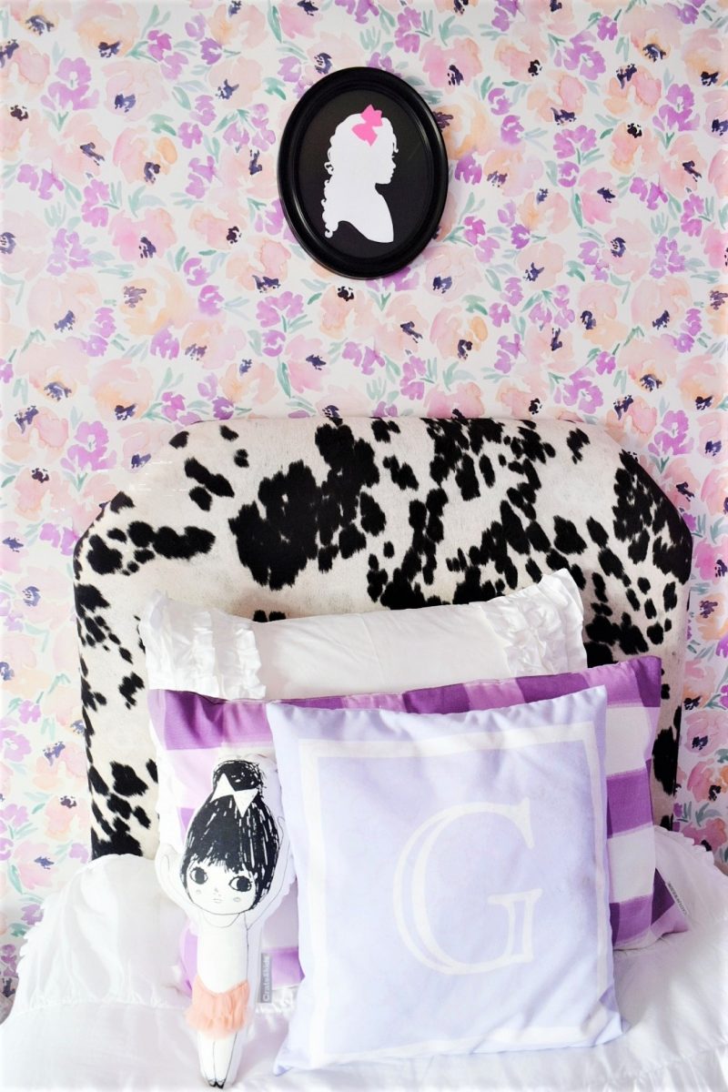 silhouette frame cowhide headboard caitlin wilson flower wallpaper monogram pillow and buffalo check pillow in little girls room