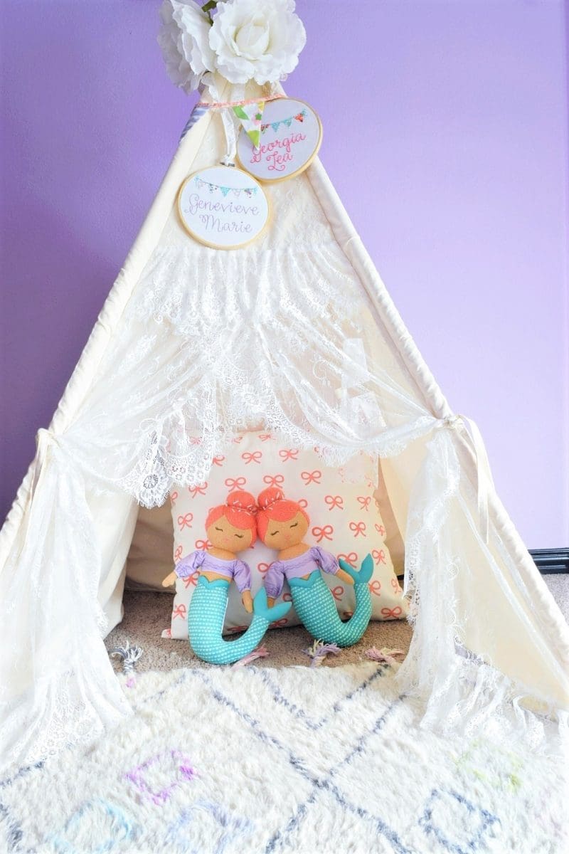 little girls bedroom teepee tent with mermaid dolls