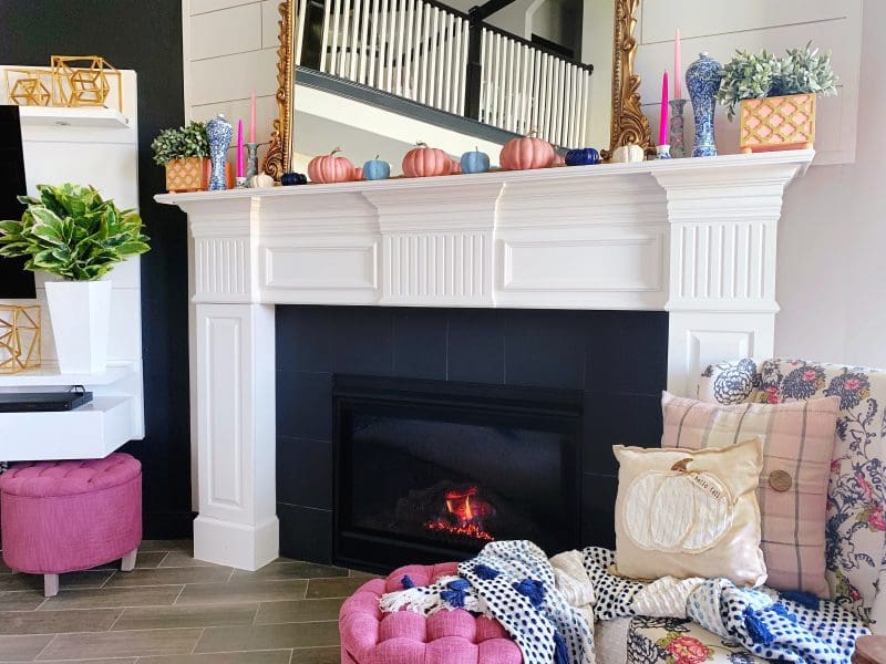 modern fall mantle with pink and blue fall color palette pink and blue pumpkins