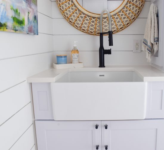 farmhouse sink in laundry room